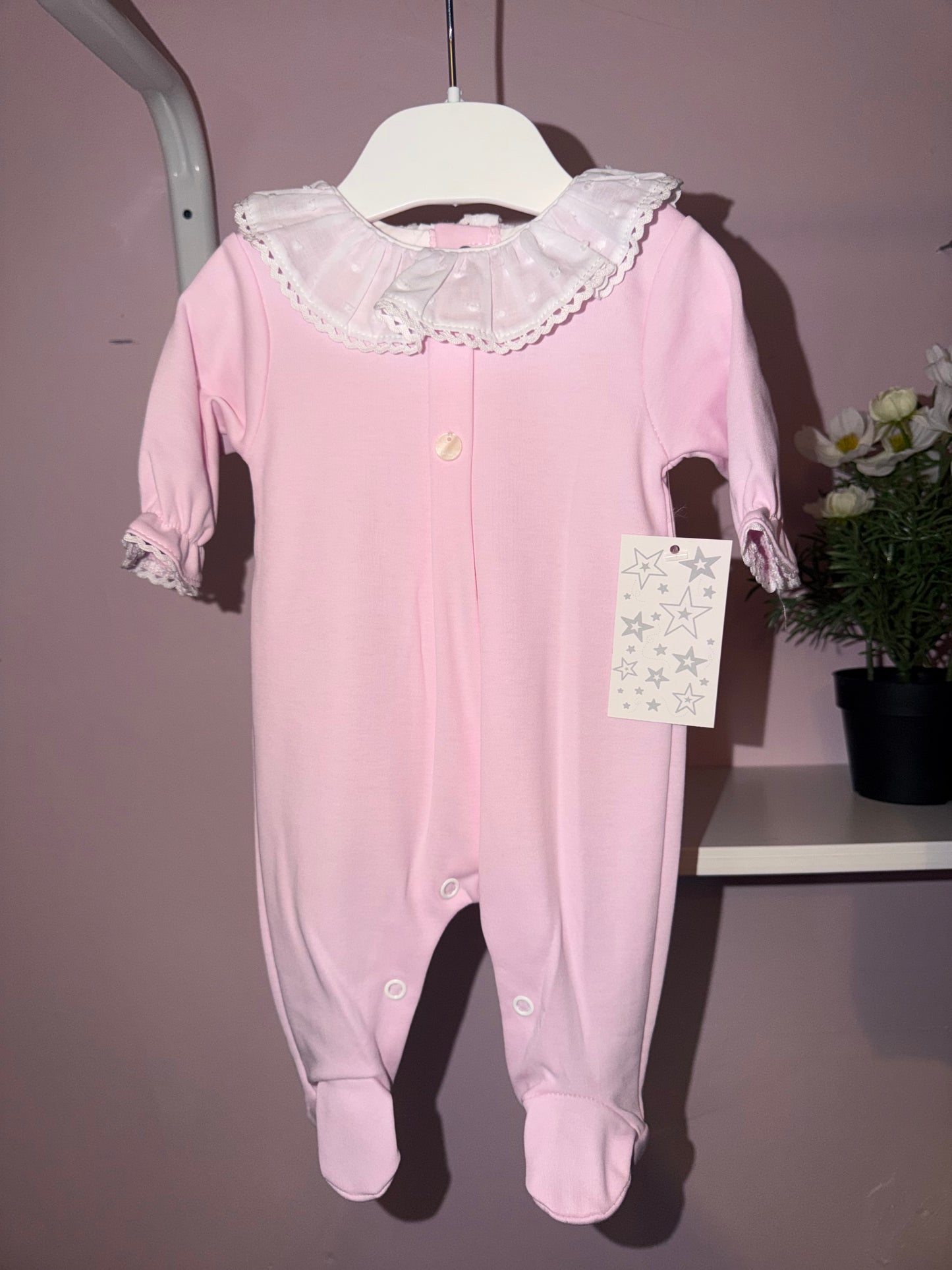 Frilly baby grow